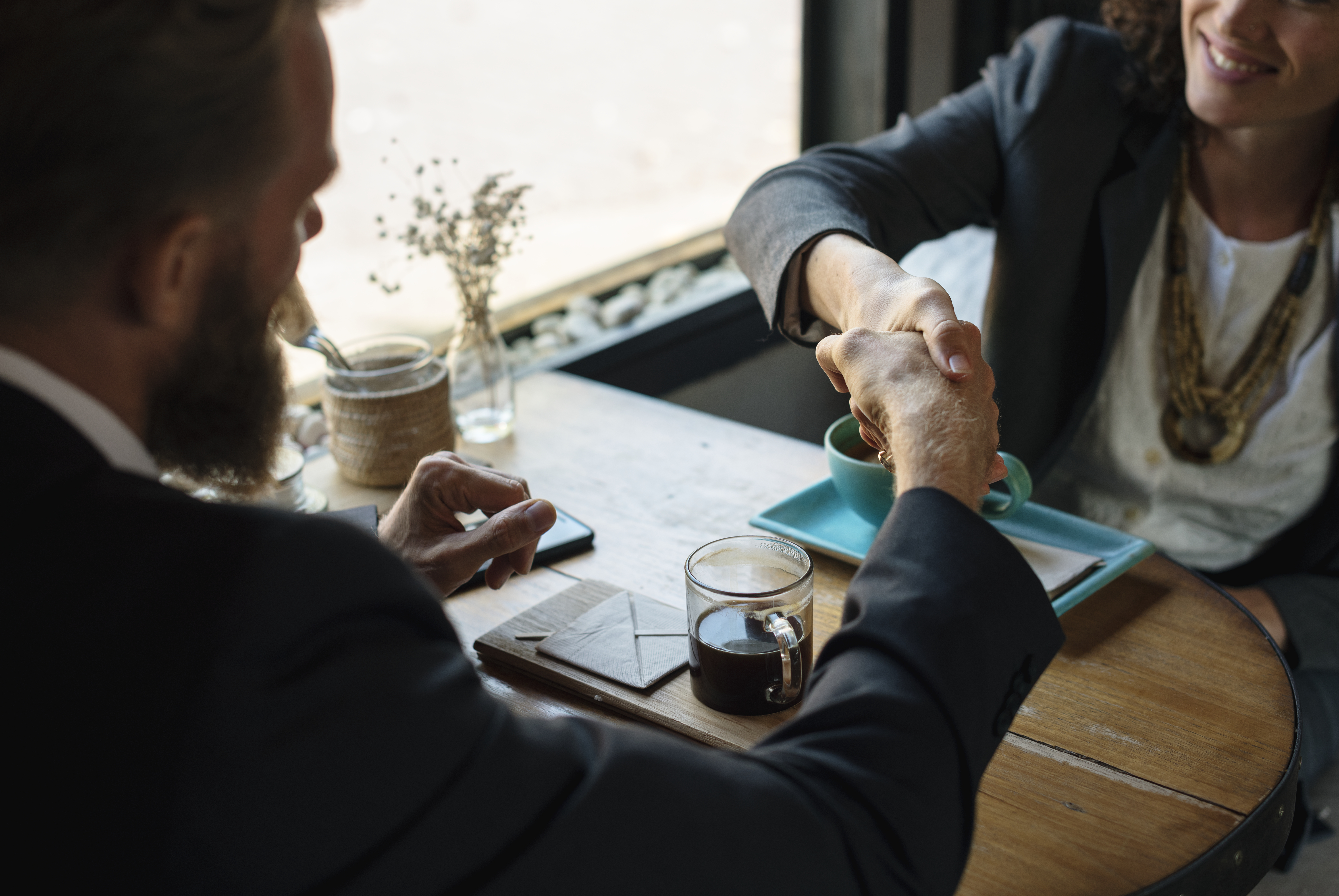 Business agreement handshake image